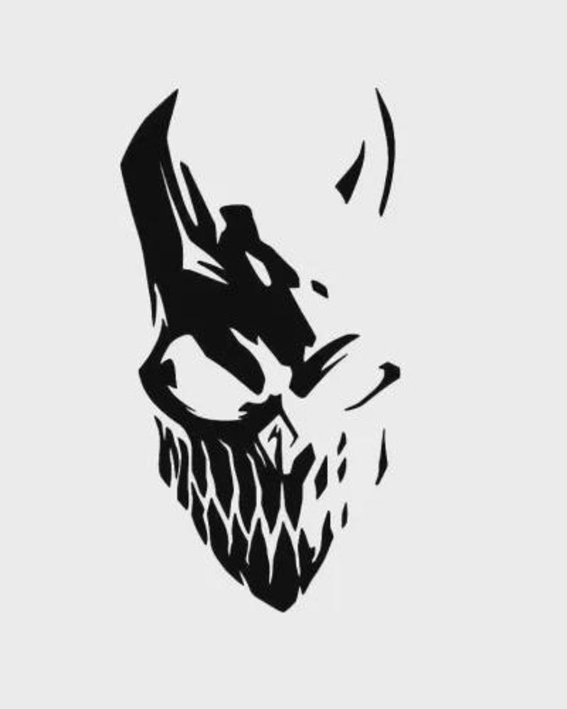May include: Black and white illustration of a stylised skull with a menacing grin. The skull has sharp teeth and a pointed chin.