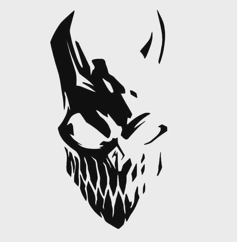 May include: Black and white silhouette of a skull with sharp teeth and horns. The skull is facing to the right and has a menacing expression.