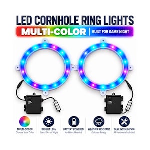 May include: Two circular LED cornhole ring lights featuring multi-color illumination. Each ring connects to a black battery pack with an on/off switch and a small control module. Text includes LED CORNHOLE RING LIGHTS, MULTI-COLOR, and BUILT FOR GAME NIGHT.