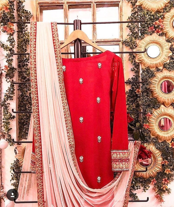 red and blue punjabi suit