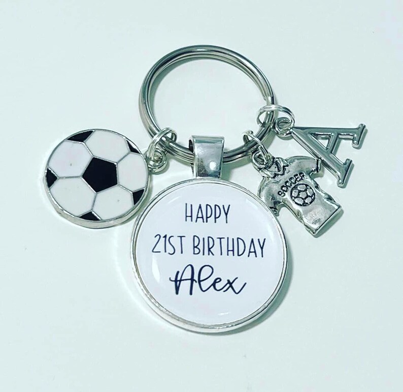 personalised happy 21st birthday keyring with football and football shirt charms added