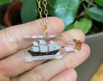 Ahoy Ahoy! Cute Laser cut Acrylic Pirate Ship in a bottle Necklace