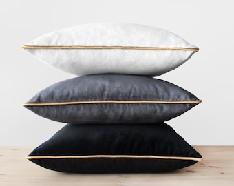 White pillows with 2025 black trim