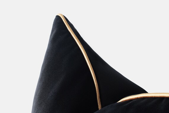 Black velvet cushions store with gold trim