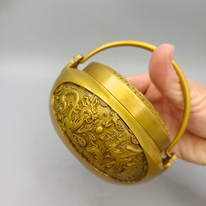 Chinesische antike reine Kupferhand geschnitzte Drachen- und Phönixmuster warme Handverzierung, exquisit und selten