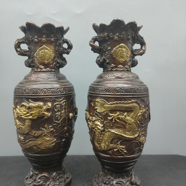 A pair of exquisite and rare pure copper carving dragon and phoenix vase ornaments handcrafted by Chinese antiques
