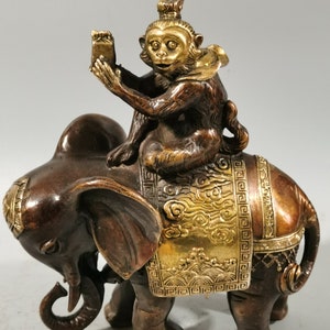 Chinese antique pure copper gilding monkey riding elephant statue,pure hand carved exquisite patterns,ancient,worthy of collection