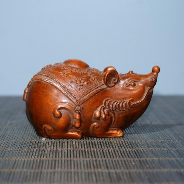 The Chinese antique natural boxwood rat statue is pure hand carved, precious and exquisite,which is worth collecting