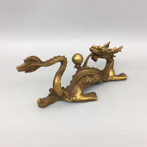 Chinese antique pure copper dragon playing with beads statue hand carvings for home decoration are worth collecting