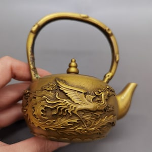 Chinese antique pure copper hand-carved dragon and phoenix pattern brass teapot wine pot ornaments, exquisite and used