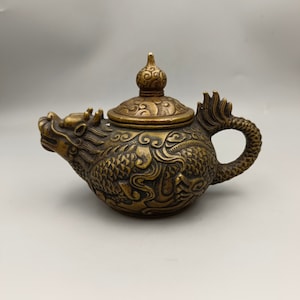 Chinese pure hand-carved brass copper teapot with dragon statue,which has collection value and can be used