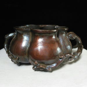 Chinese antique handmade exquisite and unique copper plum blossom statue incense burner, with beautiful shape, worth collecting and using