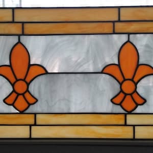 Fleur de lis&quot; transom window