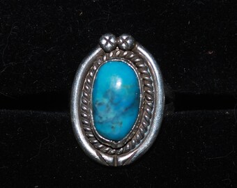 Sterling silver ring size 6 with turquoise setting.