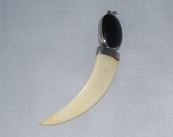 Silver with faux claw and onyx pendant