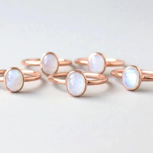 May include: A white ceramic mug with a black handle and the text "But First, Coffee" in a bold, black font. The mug is likely 4 inches tall and holds approximately 12 ounces of liquid. Perfect for enjoying your morning coffee.