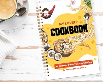 May include: A yellow and white cookbook with the title "My Lovely Cookbook" and the subtitle "An Amateur Guide To Asian Cooking by PenelopeLoveprints". The cover features illustrations of Asian food, including noodles, sushi, and a bowl of soup.