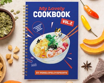 May include: A blue spiral bound cookbook with the title "My Lovely Cookbook Vol. 2: An Amateur Guide to Asian Cooking" and illustrations of cats eating Asian food.