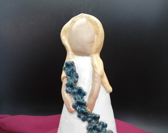 Pottery Lady with flowers
