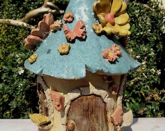 Make a Pottery Fairy House Tea light holder. Printable template and instructions.