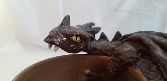 Dragon guarded dish with runic message