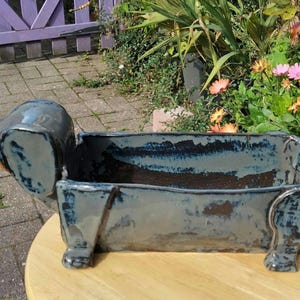 Plantilla de cerámica e instrucciones para acompañar la maceta para perro salchicha