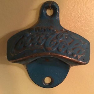 Vintage Drink Coca Cola Starr X stationary wall mount bottle opener. Screws not included. Made in USA. #2766