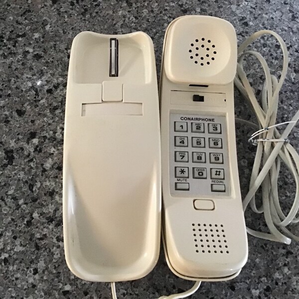 Vintage Conair push button landline slimline (SW204) off white / beige phone. #2318