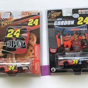 Set of 2 &quot;Winners Circle&quot; 2007 and 2009 No. 24 Jeff Gordon DuPont NASCAR race car model. 1/64 scale. #1948