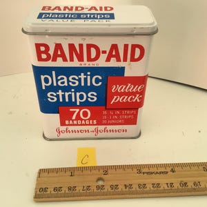 Vintage Band-Aid plastic strips &quot;70 bandages value pack&quot; empty metal box. 3 1/2&quot; x 4&quot; x 1 1/2&quot;. #2725
