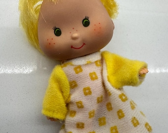 Vintage Kenner Butter Cookie doll, a baby friend from the Strawberry Shortcake Series