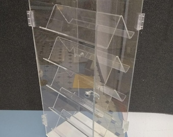 Rotating display case, two sided with shelves, locking doors keys & sign holder