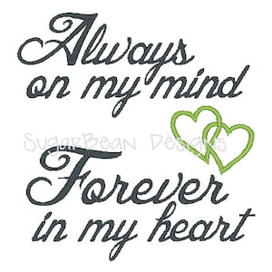 May include: Black and green cursive text reads "Always on my mind Forever in my heart". Two green intertwined hearts are above the text.