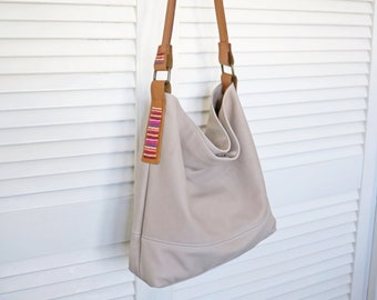 Leather Hobo Bag with Accent Beaded Detailing