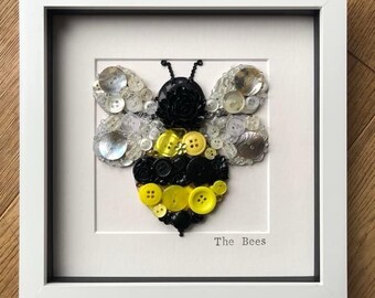 Knopf gerahmtes Geschenk