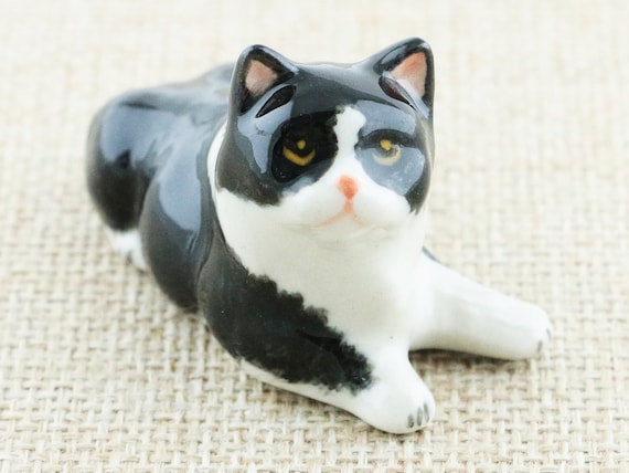 Black and white cat figurine discount
