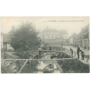 Cartão Postal Saint-Omer, França – Le Faubourg de Lyzel vers la Gare