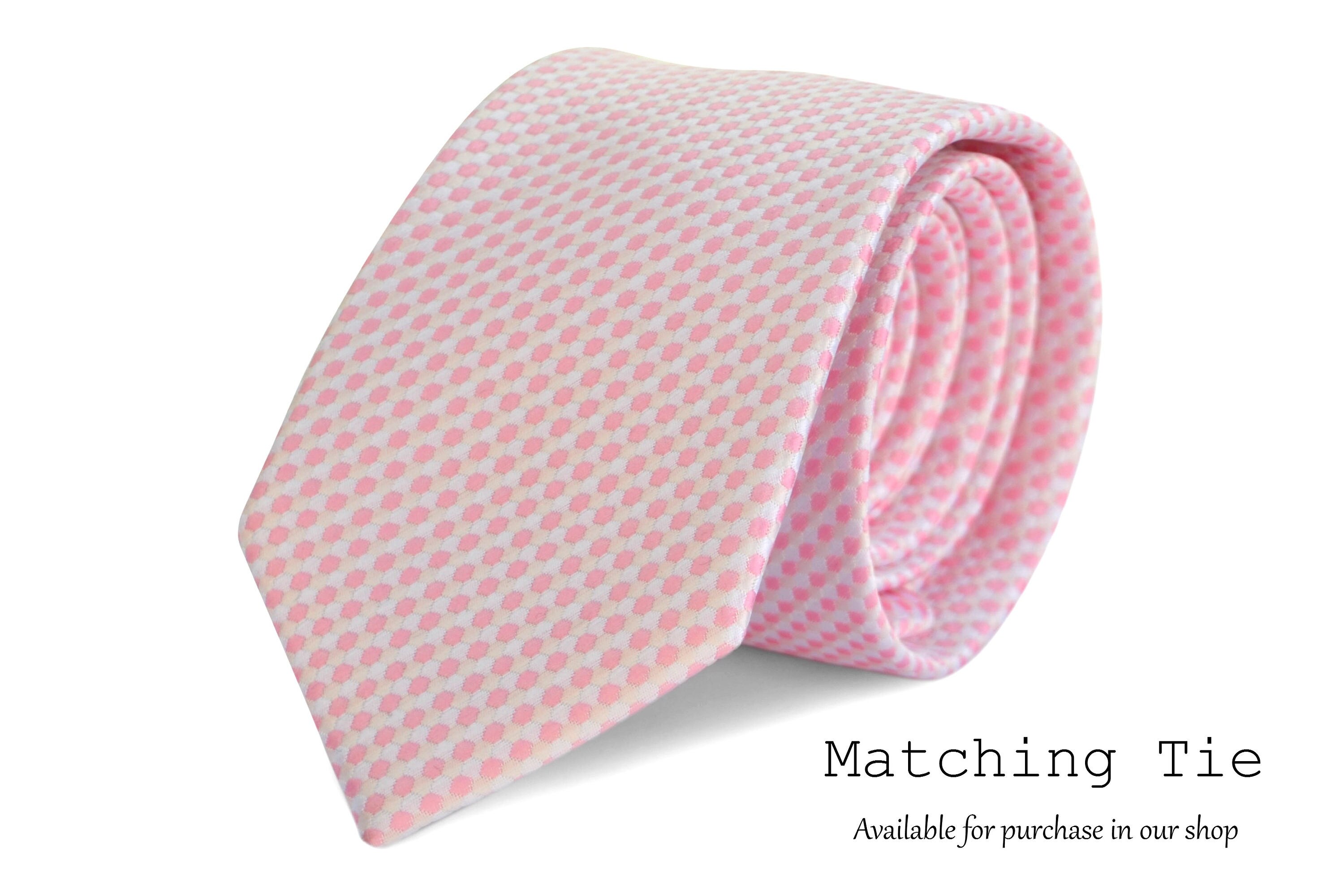 blush pink bow tie and suspenders