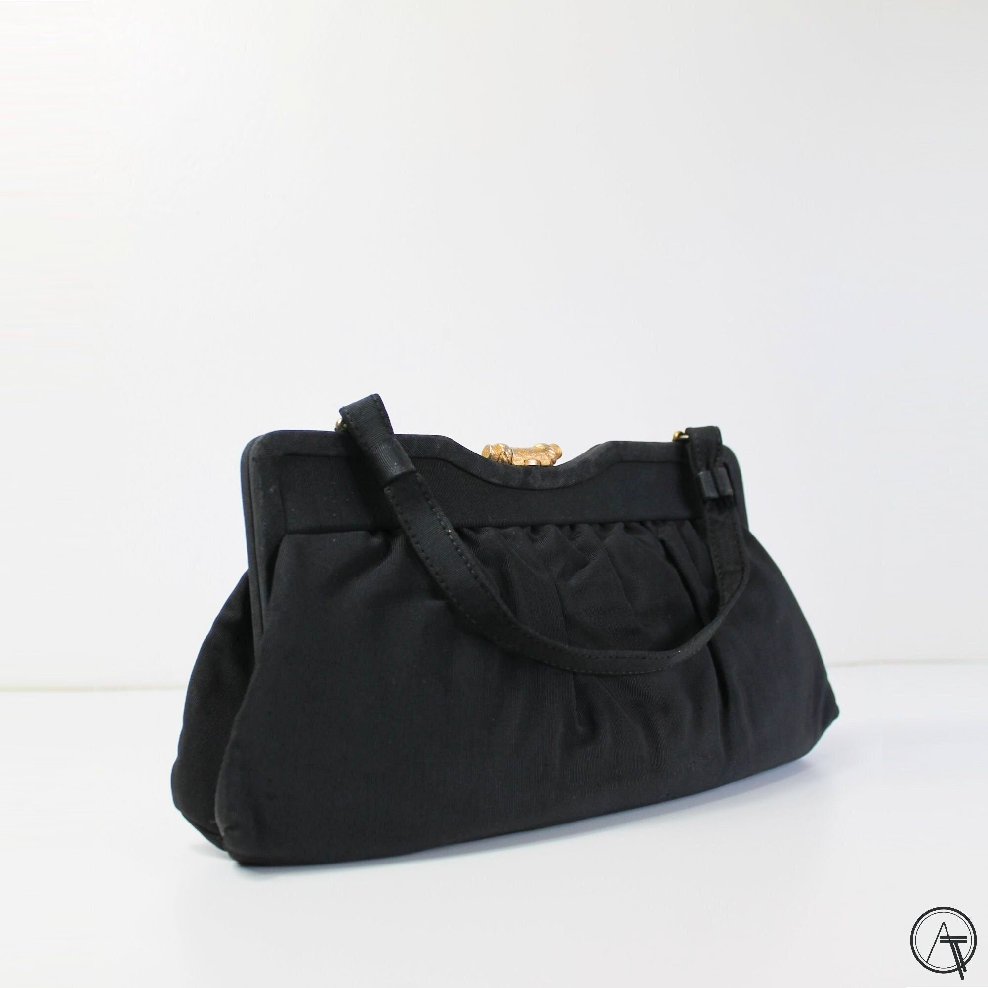 Becksöndergaard leather mini barrel shoulder bag in black