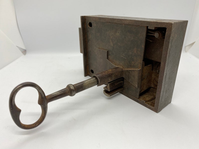 This could easily be installed on a door as fully functional Very chunky antique door lock complete with key French Key 5 13 inches
