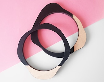 Organic shaped bangle bracelet in wood and black