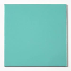 May include: A square, solid-colored, teal-colored object. The object has a smooth, matte finish and is set against a white background. The edges are clean and sharp, creating a modern aesthetic. The color is consistent across the surface.