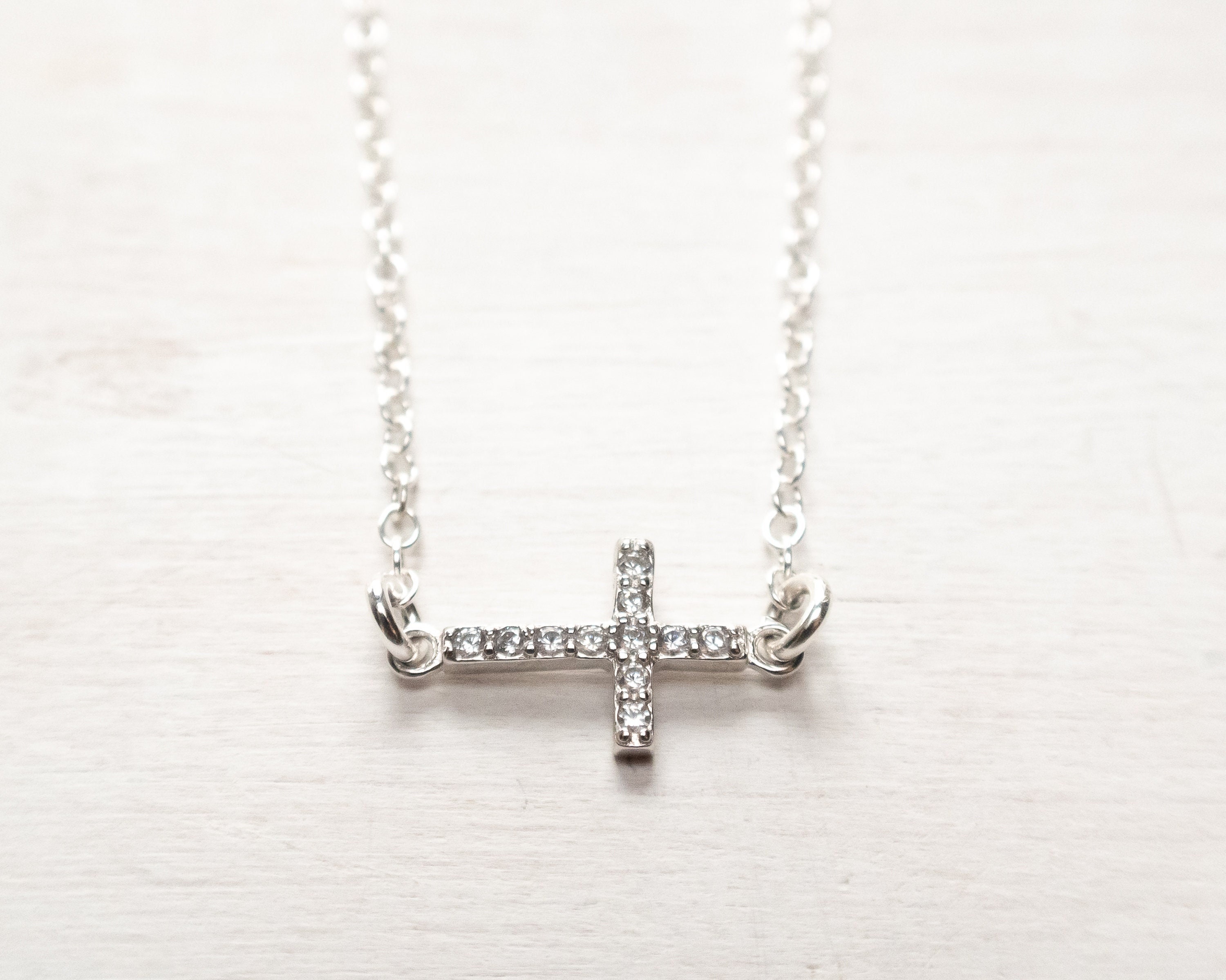 Tiny sideways sale cross necklace