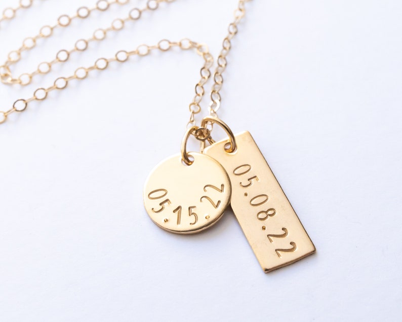 The date charms are shown on a delicate gold filled chain to help visualize them as a complete necklace. The chain is not included with the charms in this listing.