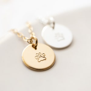 This picture show the close up of the gold filled necklace, the silver one is in the background.