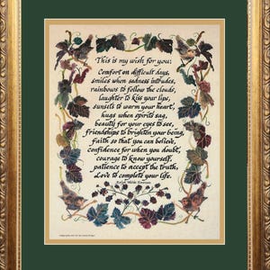 May include: A framed print with a gold ornate frame and a green mat. The print features a poem with calligraphy and illustrations of birds and leaves. The text reads "This is my wish for you..." by Ralph Waldo Emerson.
