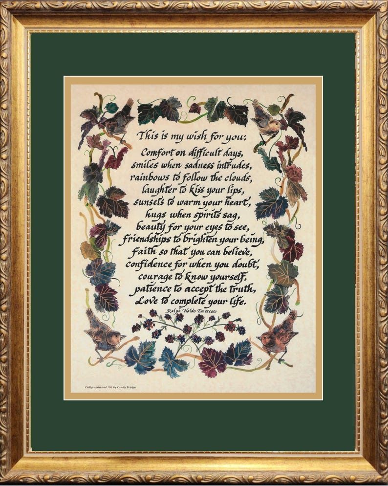 May include: A framed print with a gold ornate frame and a green mat. The print features a poem with calligraphy and illustrations of birds and leaves. The text reads "This is my wish for you..." by Ralph Waldo Emerson.