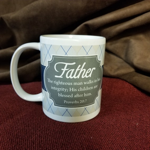 Father mug with the verse Proverbs 20:7 - The righteous man walks in his integrity; His children are blessed after him.