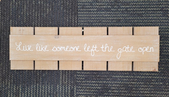 Live like someone left the gate open pallet sign