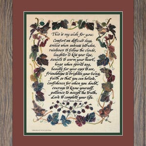 May include: A framed print featuring a quote by Ralph Waldo Emerson, surrounded by a decorative border of leaves and birds. The text, in elegant calligraphy, reads "This is my wish for you..." and continues with a message of hope and encouragement.